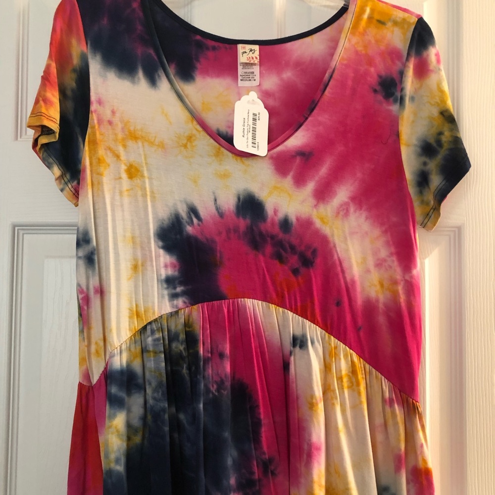 7th Ray top, M, new with tags. Peplum style, with stretch